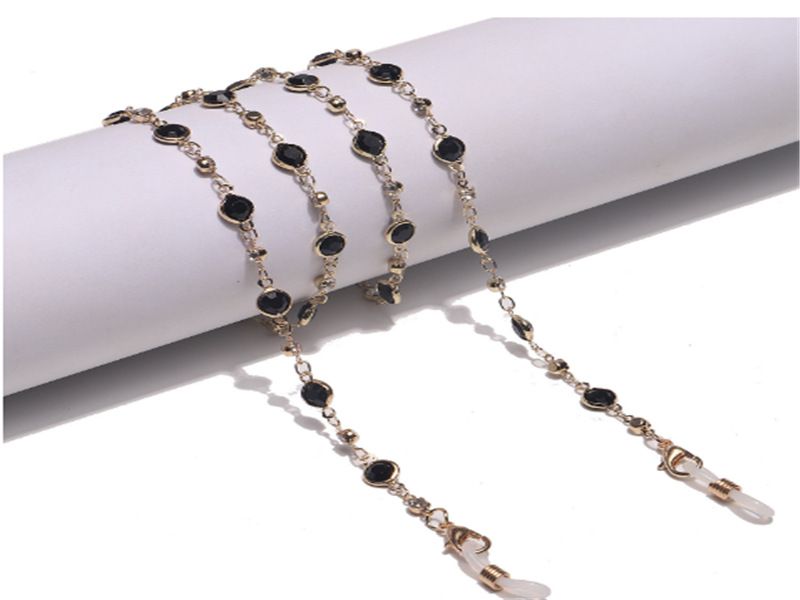 Catena per occhiali con mascherina in strass in vetro nero e oro semplice e alla moda_voghion.com