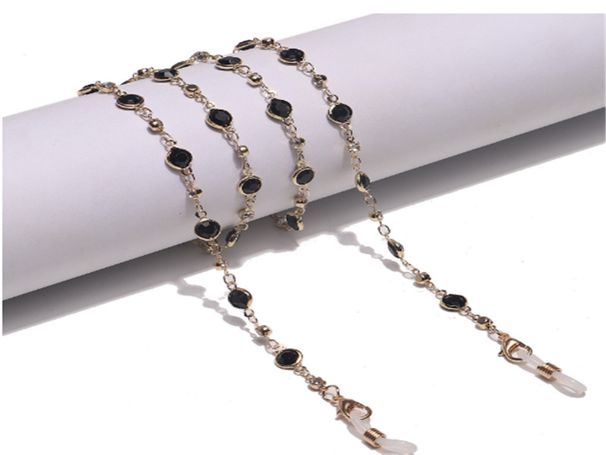 Catena per occhiali con mascherina in strass in vetro nero e oro semplice e alla moda_voghion.com