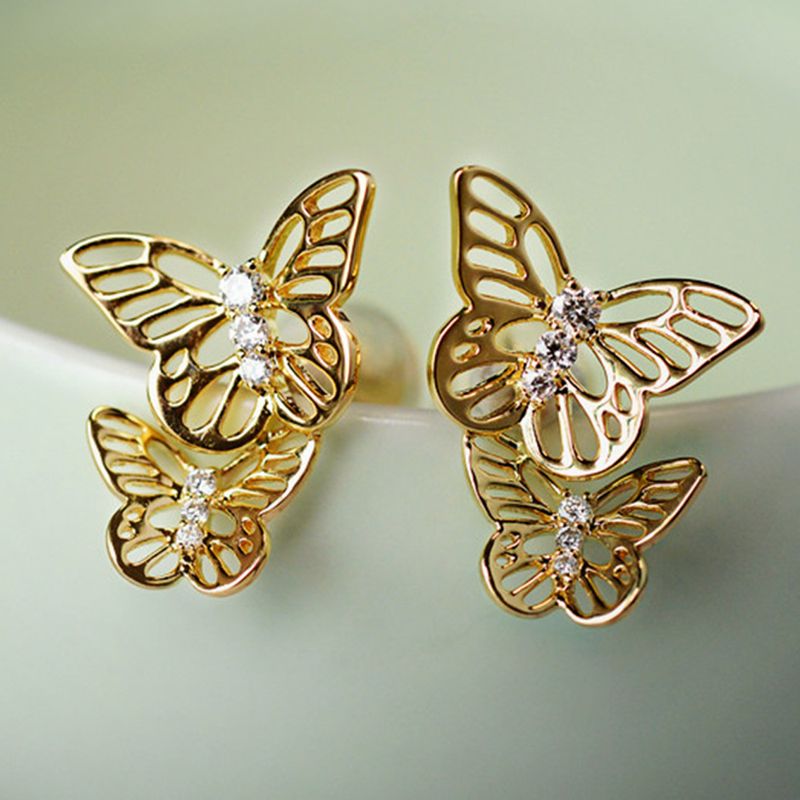 Cao Shi Fashion Youth Hollow Butterfly Earrings Electroplated Copper Inlaid Zircon Student Youth Girl Earrings_voghion.com
