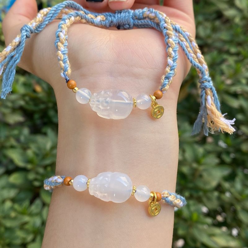 Bracciale Ruyi in agata naturale intrecciata con cordino in stile etnico tibetano fatto a mano_voghion.com