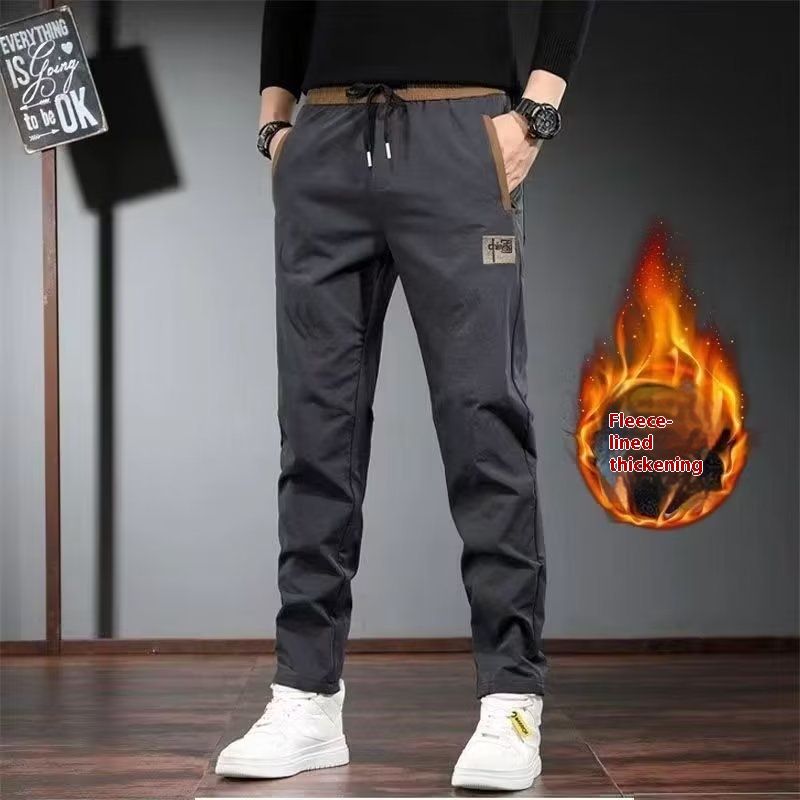 Pantaloni casual con cerniera per uomo in autunno e inverno, nuovi pantaloni aderenti a gamba piccola, marchio alla moda versatile con peluche_voghion.com