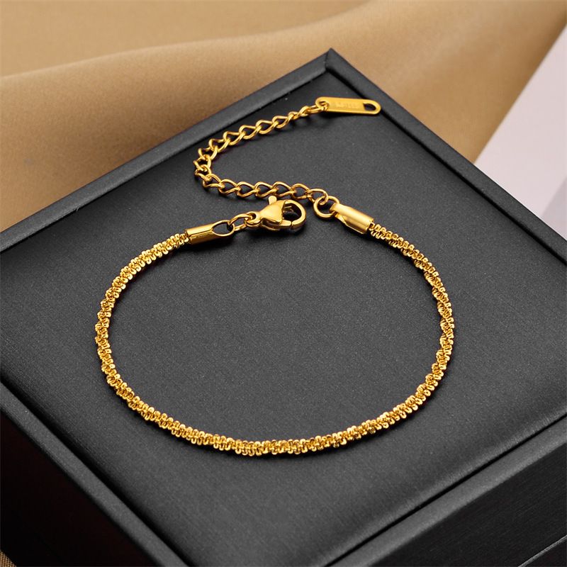 Fashionable and simple niche design light luxury temperament versatile titanium steel rotating thread twist chain necklace bracelet set_voghion.com