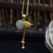 Collana con ciondolo in giada Hetian con montatura in argento e nappa - Design semplice ed elegante a forma di zucca Yuanbao per le donne, regalo ideale_voghion.com
