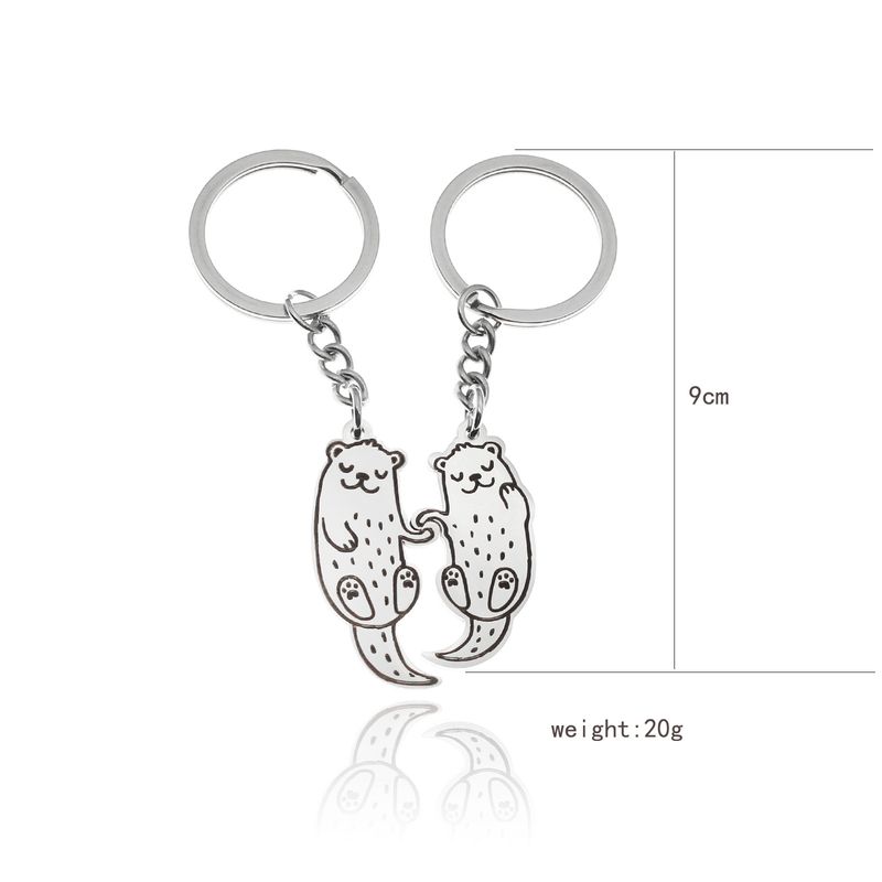 Ein Paar befreundeter Otter, die Händchen halten, ihre besten Freunde, Schlüsselanhänger aus Metall, Anhänger_voghion.com