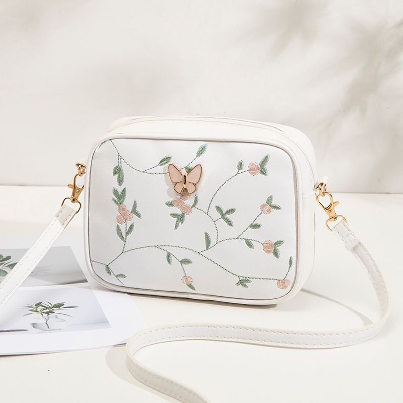 Borsa a tracolla da donna in cotone ricamato con motivi floreali - Portafoglio spazioso 8x5 pollici con tracolla regolabile_voghion.com