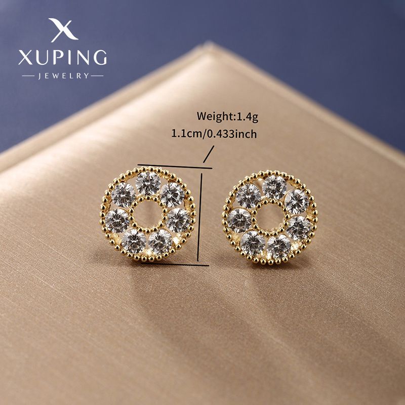 1 paire de boucles d'oreilles en forme de cœur en alliage de cuivre plaqué or 14 carats avec incrustations de pierres précieuses artificielles en forme de moulin à vent de style simple Xuping_voghion.com