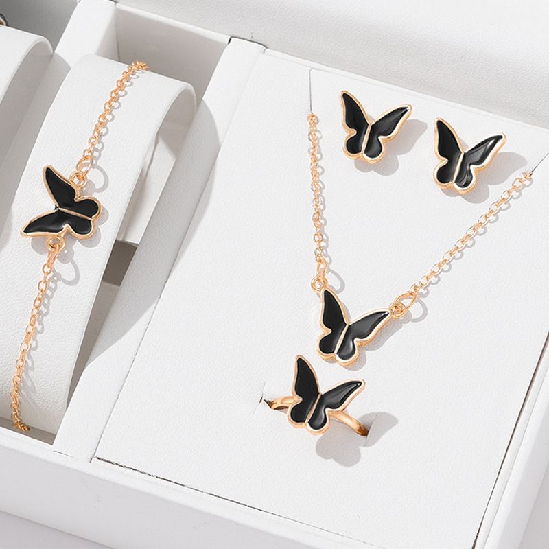 Vlindersieradenset voor dames - elegante 4-delige ketting, armband, oorbellen en ring, trendy casual accessoires_voghion.com