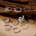 Set di anelli impilati vintage etnici bohémien da donna, design a serpente e girasole, anello con giunto a foglia retrò semplice e di nicchia, set da 10 pezzi_voghion.com