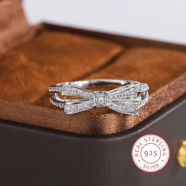 Vendita calda Argento placcato per le donne Bellissimo fiocco scintillante Zircone Festa Gioielli Fidanzamento Anello di nozze_voghion.com