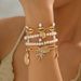 Bohemian Armband Großhandel Europäischen Und Amerikanischen Neue Urlaub Stil Reis Perlen Legierung Conch Shell Anhänger Armband Set_voghion.com