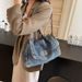 Xiaoxiangfeng denim chain shoulder women's fashionable commuting armpit bag, textured travel handbag_voghion.com