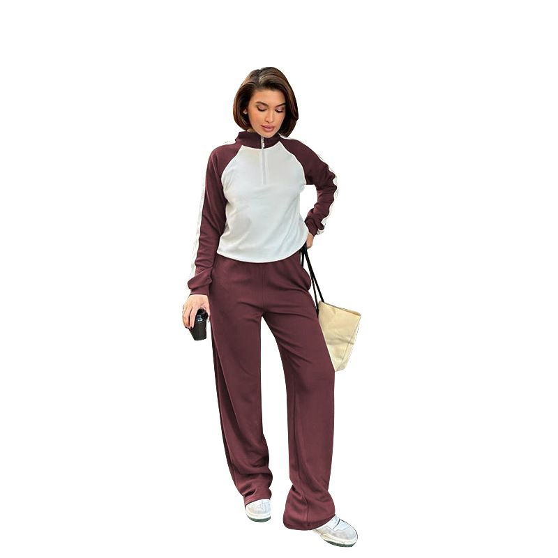Completo da donna con felpa con cappuccio, zip e maniche lunghe a blocchi di colore e pantaloni a gamba larga - Outfit casual alla moda per la primavera e l'autunno_voghion.com