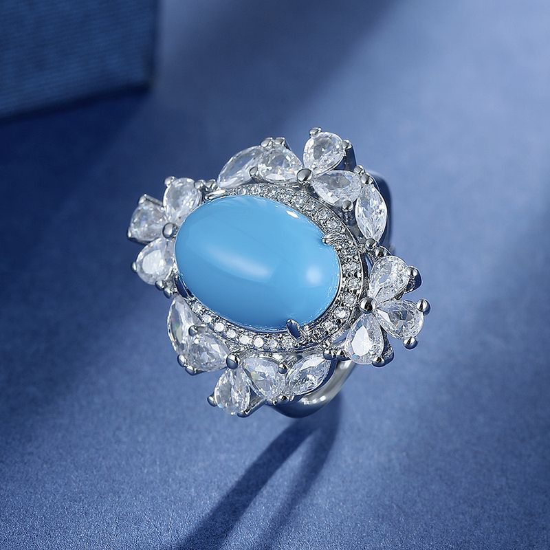 Anello aperto regolabile con zirconi blu sintetici in stile gioielli_voghion.com
