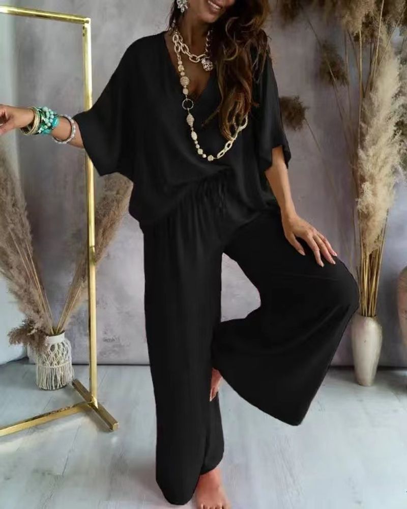 Tailleur pantalone casual con gambe larghe larghe con scollo a V e maniche a pipistrello_voghion.com