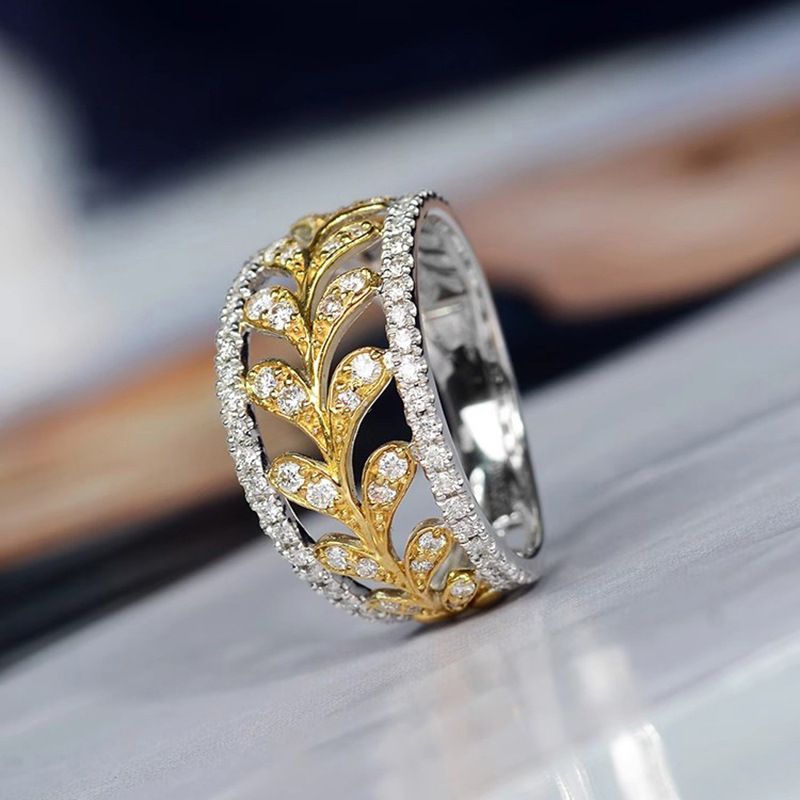 Anello in stile pastorale con foglia d'albero bicolore e zirconi intarsiati, stile Cao Shi Metal Lock Edge_voghion.com