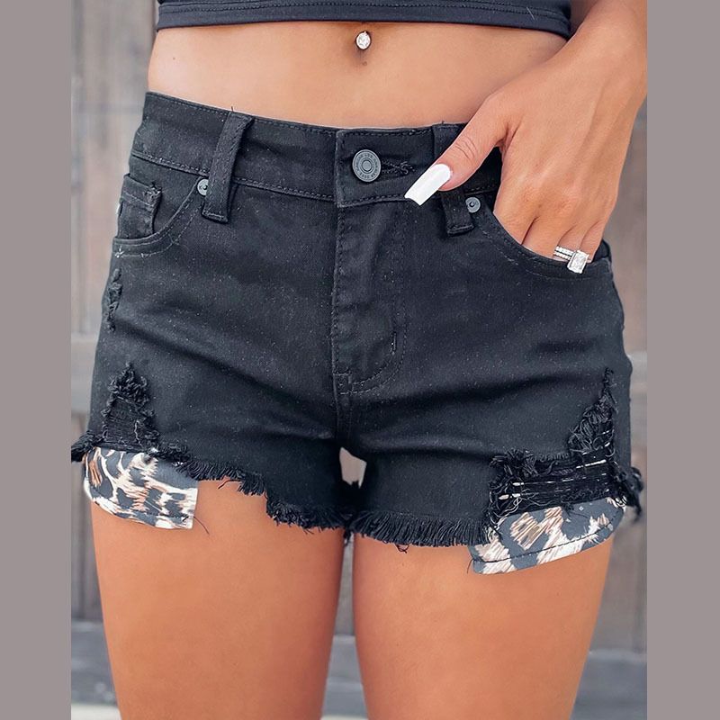 Pantaloncini di jeans con frange a vita alta alla moda da donna_voghion.com