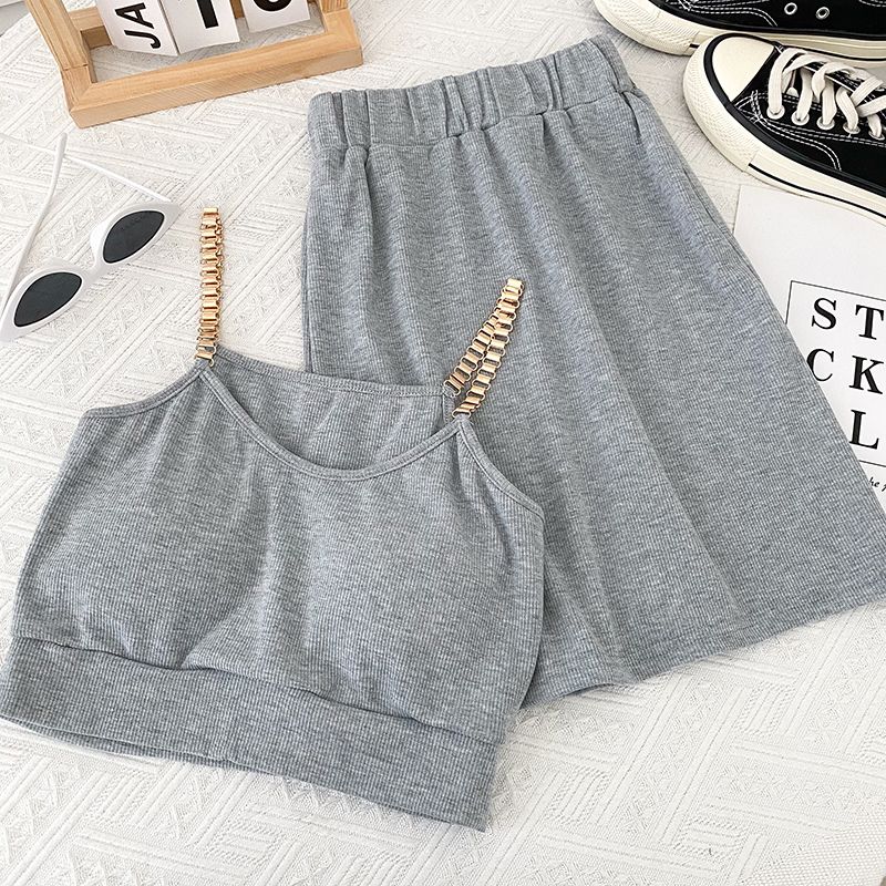 Set due pezzi con canotta corta a catena sexy da donna, gonna aderente a vita alta e gonna a vita alta_voghion.com