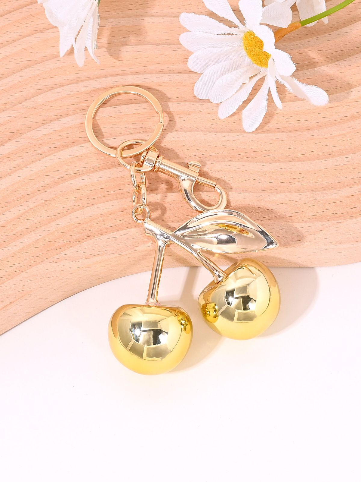 Portachiavi con ciondolo a forma di frutta e specchio con borsa di ciliegie_voghion.com