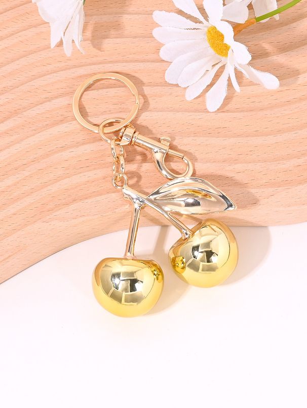 Portachiavi con ciondolo a forma di frutta e specchio con borsa di ciliegie_voghion.com