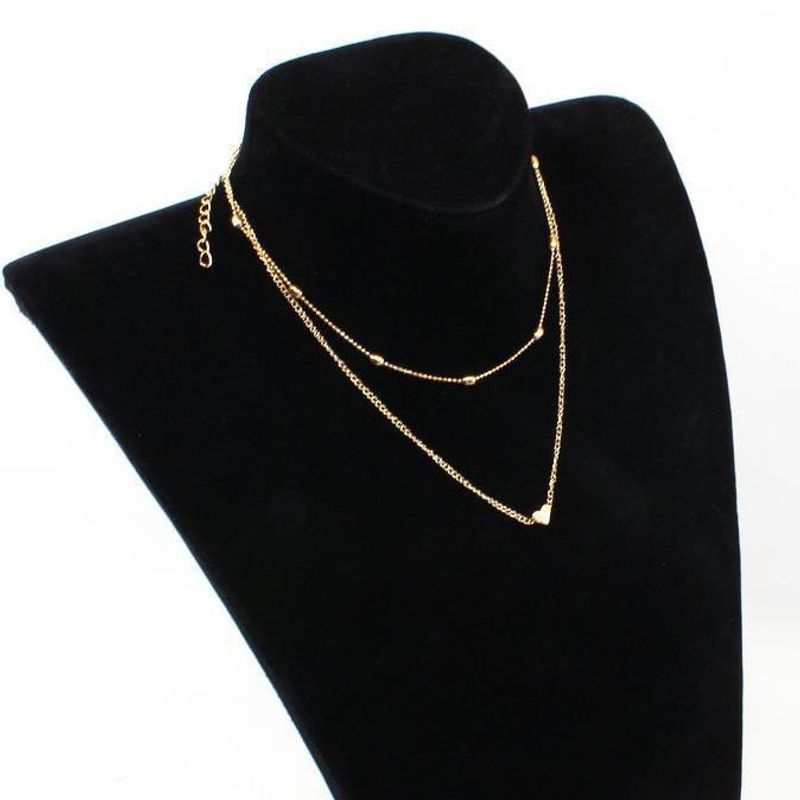 Collana con clavicola multistrato a forma di cuore in rame, semplice e alla moda, da donna_voghion.com