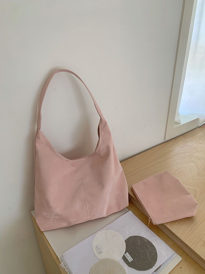 Kvaliteetne ja nišiklassi naiste ühe õla ja kaenla all kantav crossbody-kott, suvine 2024. aasta uus suure mahutavusega pendelrännaku seljakott_voghion.com