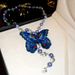 Collana con ciondolo a farfalla in vetro intrecciato, lusso leggero, temperamento di nicchia, catena per maglioni, lunga e versatile, autunno_voghion.com