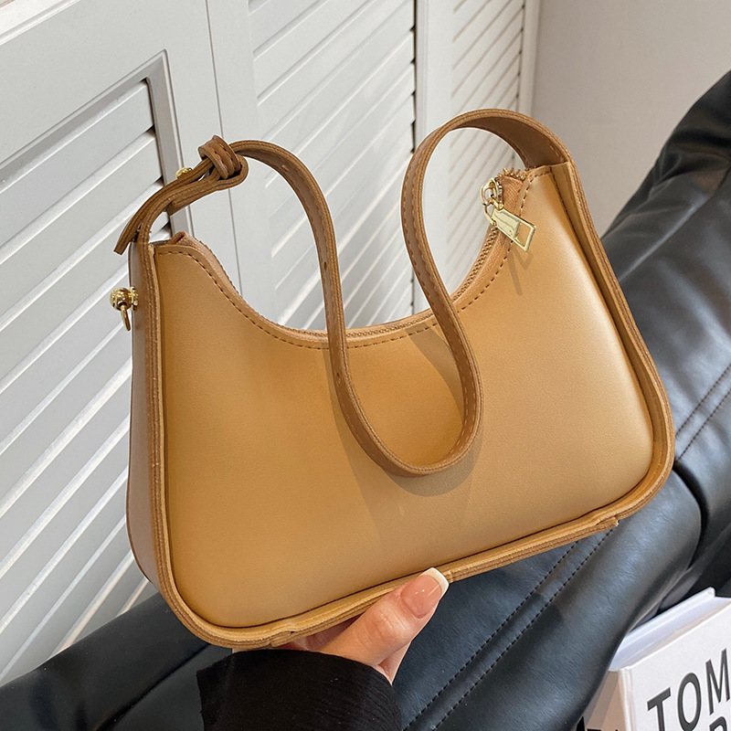 Niche Design Underarm Bag Jingle 2023 New Summer Fashion Portable Small Satchel high-level sense Messenger shoulder bag_voghion.com