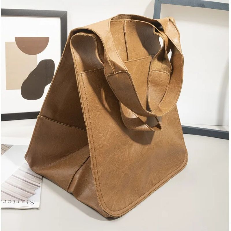 Europäische und Amerikanische Mode Retro 2024 Neue Einfache Große Tasche Weichem Leder Große Kapazität Eine Schulter Handheld Tote frauen tasche_voghion.com