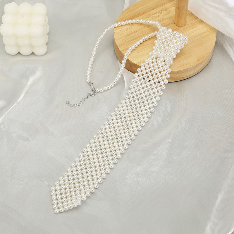 Französisches Designgefühl, passender JK-Hemdanzug, kurze Accessoires, elegantes Temperament, Perlenkrawatte im INS-Stil_voghion.com