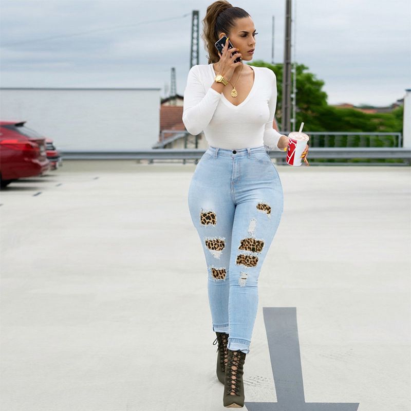 European and American slim fitting high stretch jeans with leopard print patch for women's long pants_voghion.com