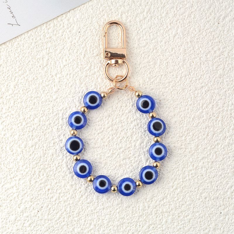 Piezas y accesorios para bolsos Estilo étnico retro Llavero de cuerda de ojo de diablo Resina Ojos azules Colgante de bolso Colgante de joyería_voghion.com