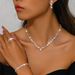Ensemble de bijoux pour femmes, mode exquise, vente chaude, collier à griffes, boucles d'oreilles, bracelet, bague, ensemble quatre pièces, chaîne de clavicule entièrement en diamant, robe de soirée_voghion.com