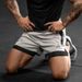 Doppellagige Gym-Shorts für Herren – Schnelltrocknende Mesh-Trainingsshorts mit Kompressionsfutter (Seitentaschen zum Laufen und Krafttraining)_voghion.com