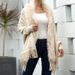 Wind autumn/winter tassel shawl fur collar cape solid color knitted sweater jacket_voghion.com