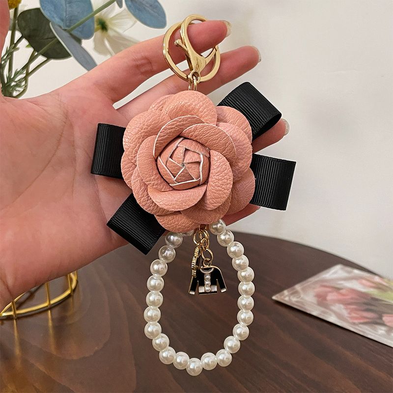 Versão coreana da moda nova arco camélia chaveiro pérola cordão bolsa decoração pingente presente requintado_voghion.com