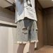 Ausgewaschene Denim-Shorts im Used-Look, trendige Sommer-Freizeithose für Herren im amerikanischen Stil, mit Design-Feeling und gerüschtem Rand_voghion.com