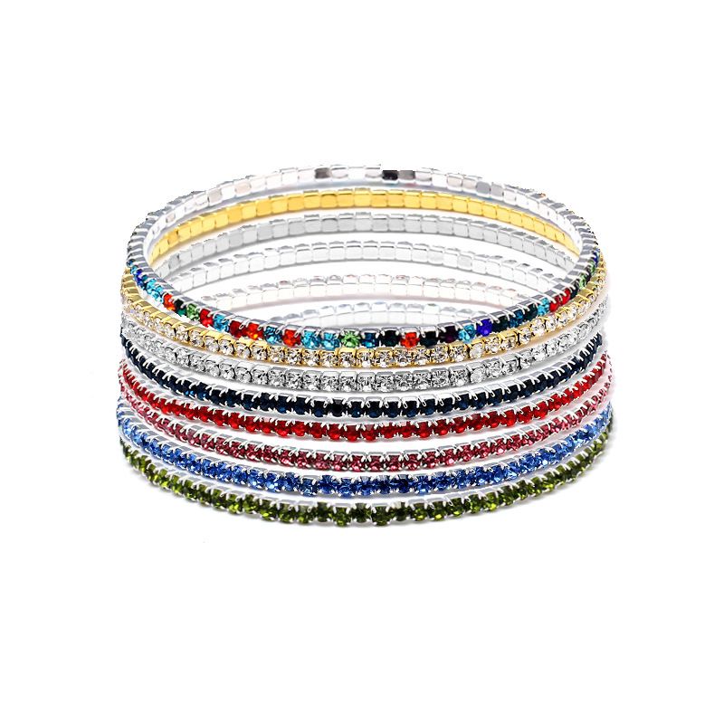 Bracciale rigido da donna con catena a griffe elastica, zirconi e strass, tempestato di diamanti e diamanti colorati_voghion.com