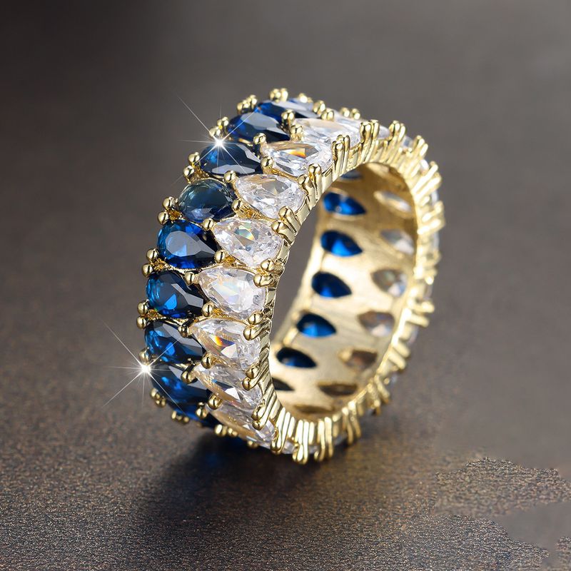 Anello classico bicolore con zircone e ruota, gioiello completamente intarsiato, stile femminile_voghion.com