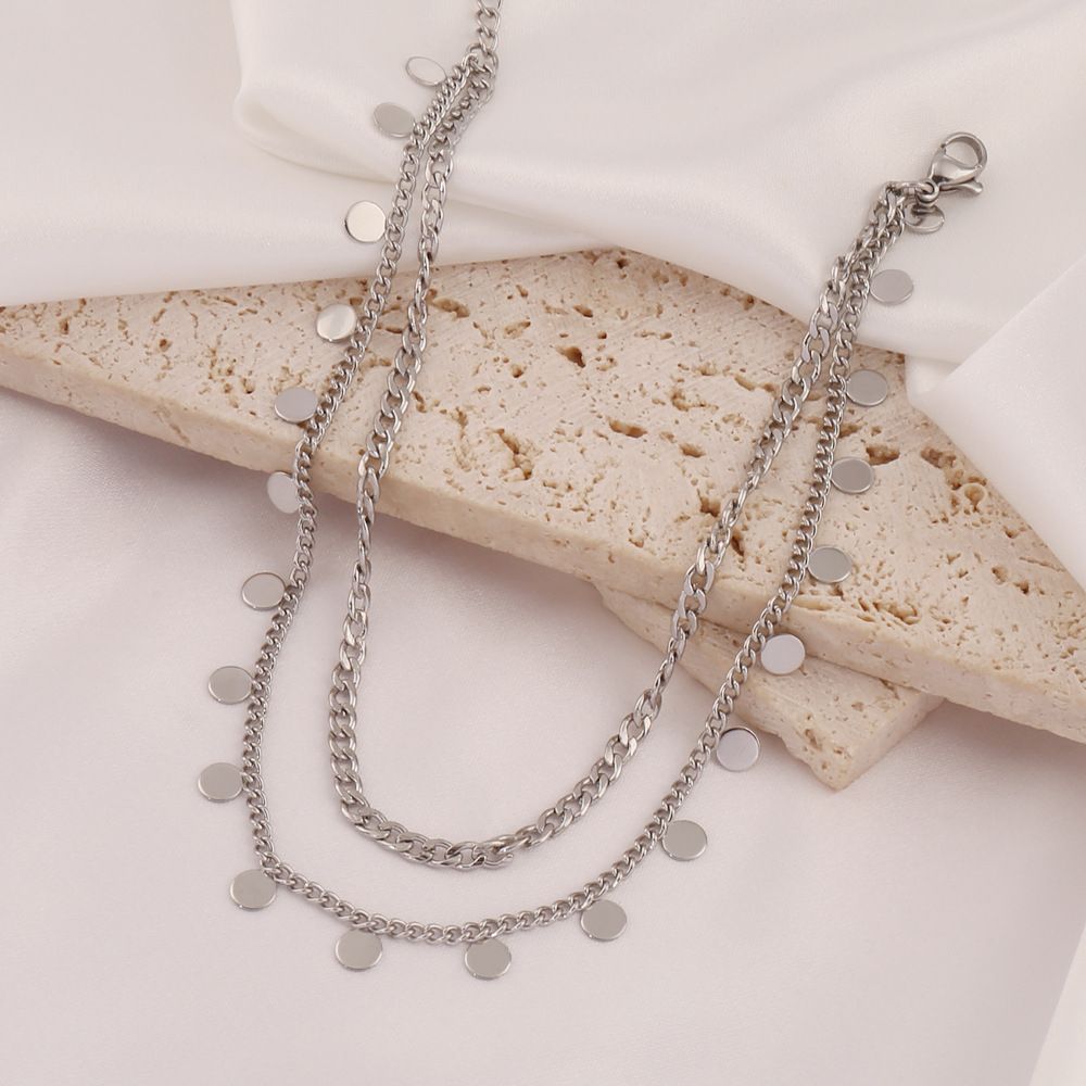 Cavigliera a doppio strato da spiaggia in acciaio inossidabile placcato oro con nappa rotonda per donna, design alla moda_voghion.com