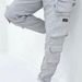 2024 Men's casual versatile leggings sports with large pockets, zipper decoration, workwear pants_voghion.com