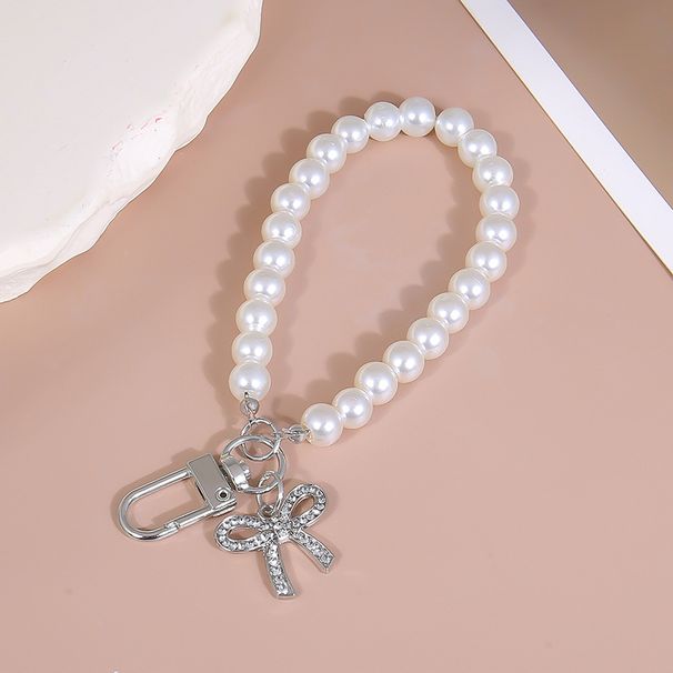 Handyhülle Zubehör Schleife Diamant Anhänger Glas Imitation Perle Hand gehalten Perlenkette Kurze Kette Taschenanhänger_voghion.com