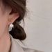 Flower Shell For Women 2025 New Light Luxury High-end Sense Stud Elegant Drop Niche Design Pearl Earrings_voghion.com
