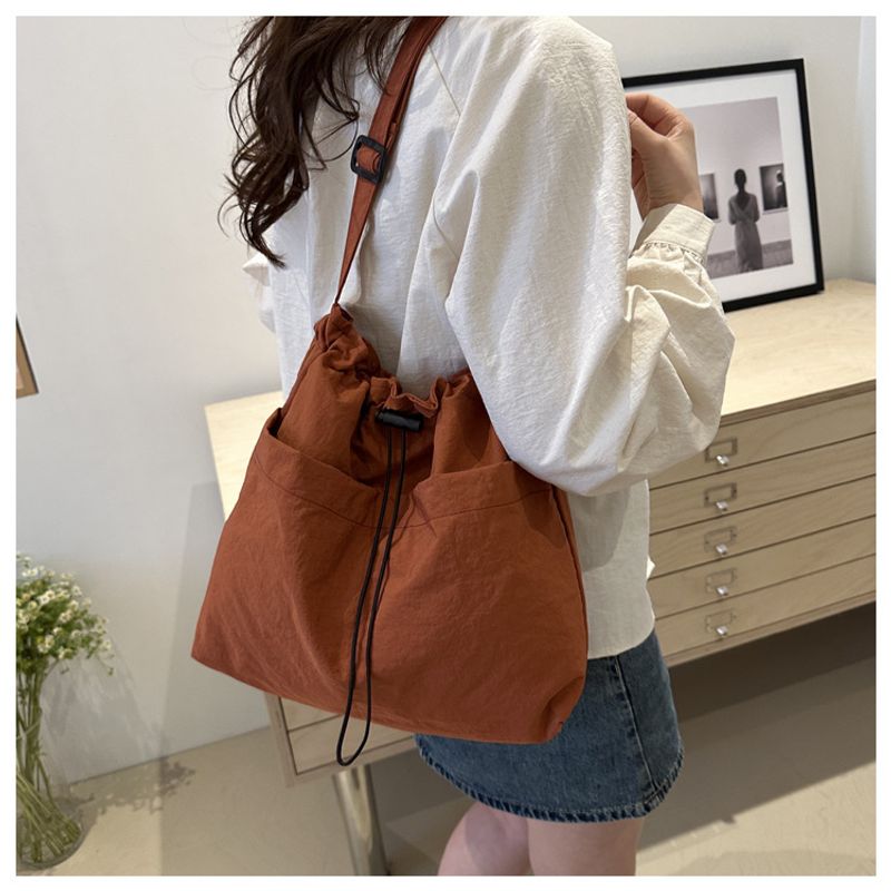Large Capacity Drawstring Bucket Bag for Women 2024 New Japanese Ins Casual Crossbody Bag Street Shoulder Commuting Bag_voghion.com