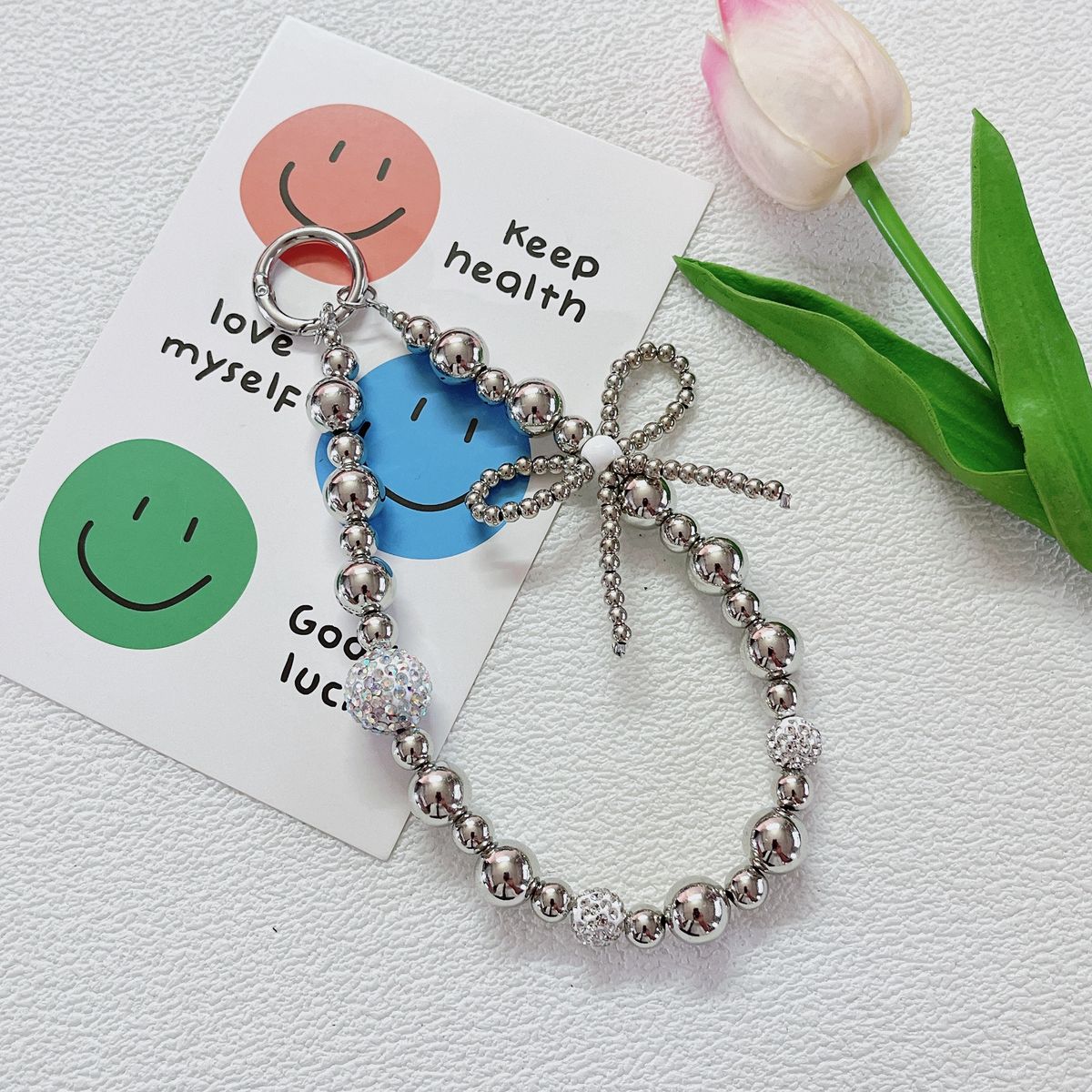 Light Luxury Style Electroplated Bow Inlaid Diamond Beads Mobile Phone Chain Student Bag Pendant_voghion.com