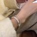 Light luxury niche design broken silver pearl bracelet 2023 new temperament silver stacking hand jewelry ins_voghion.com