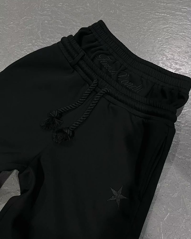 Herrenbekleidung Neue beliebte Fünfzackige Sterndruckserie Teenager Paare Lässige gefälschte zweiteilige Hose mit weitem Bein_voghion.com