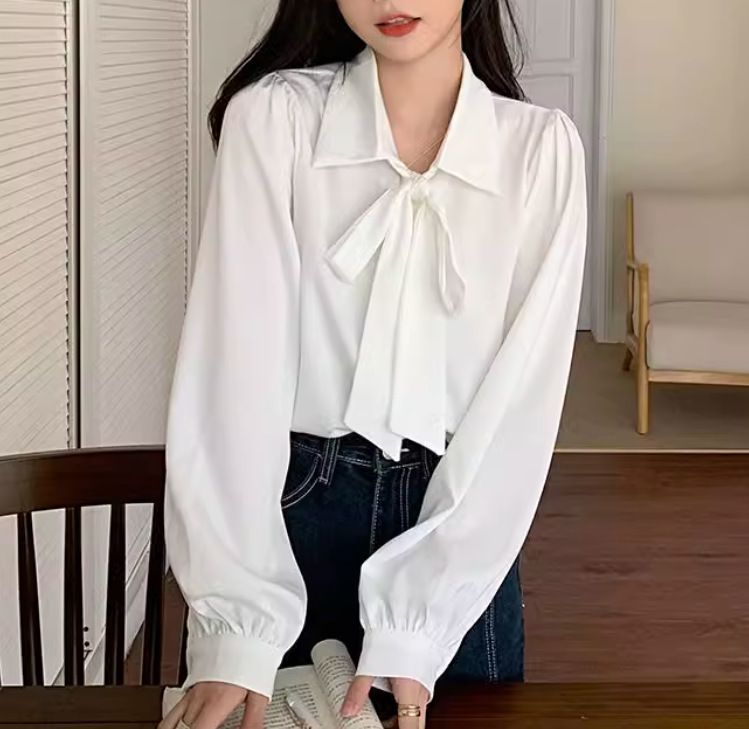 Camicia bianca da donna nuova primavera e autunno 2024 con fiocco francese in basso e manica lunga_voghion.com