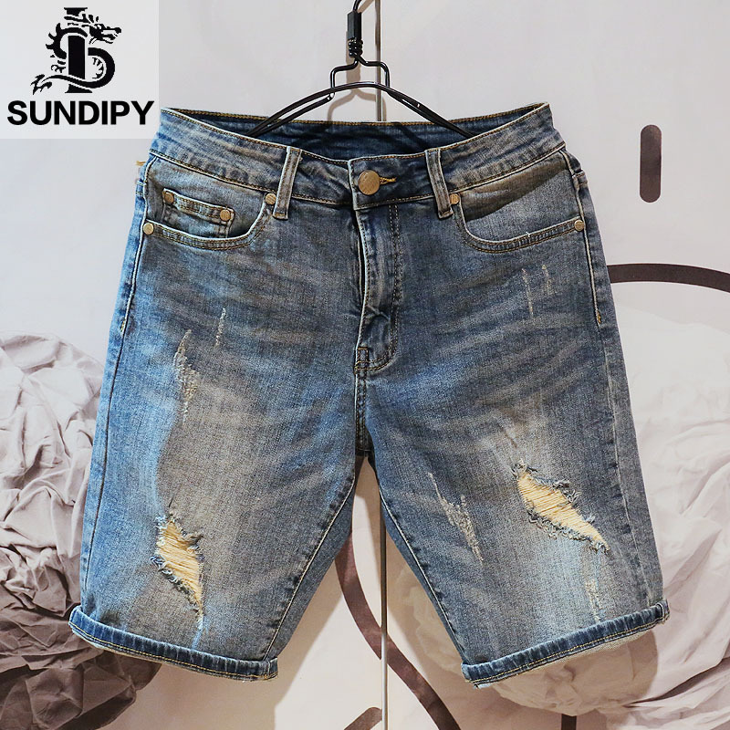 Pantaloncini di jeans larghi e bucati alla moda coreana da uomo, pantaloncini di jeans cargo blu da uomo, belli e giovani_voghion.com