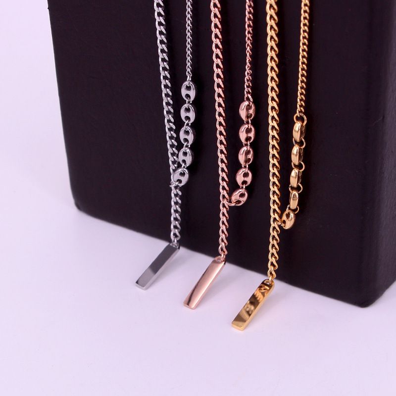 Collier Lucky Draw X7-206 pour femme, design de niche, élégant et luxueux, petit lingot d'or en acier titane_voghion.com