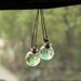 Colgante de cristal para interior de coche, pequeño y fresco, con forma de botella de perfume artística._voghion.com